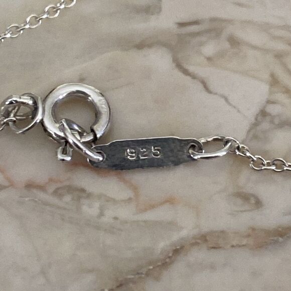 Tiffany & Co. 18K Gold & Sterling Silver Heart & Bow Ribbon Necklace - Picture 6 of 10